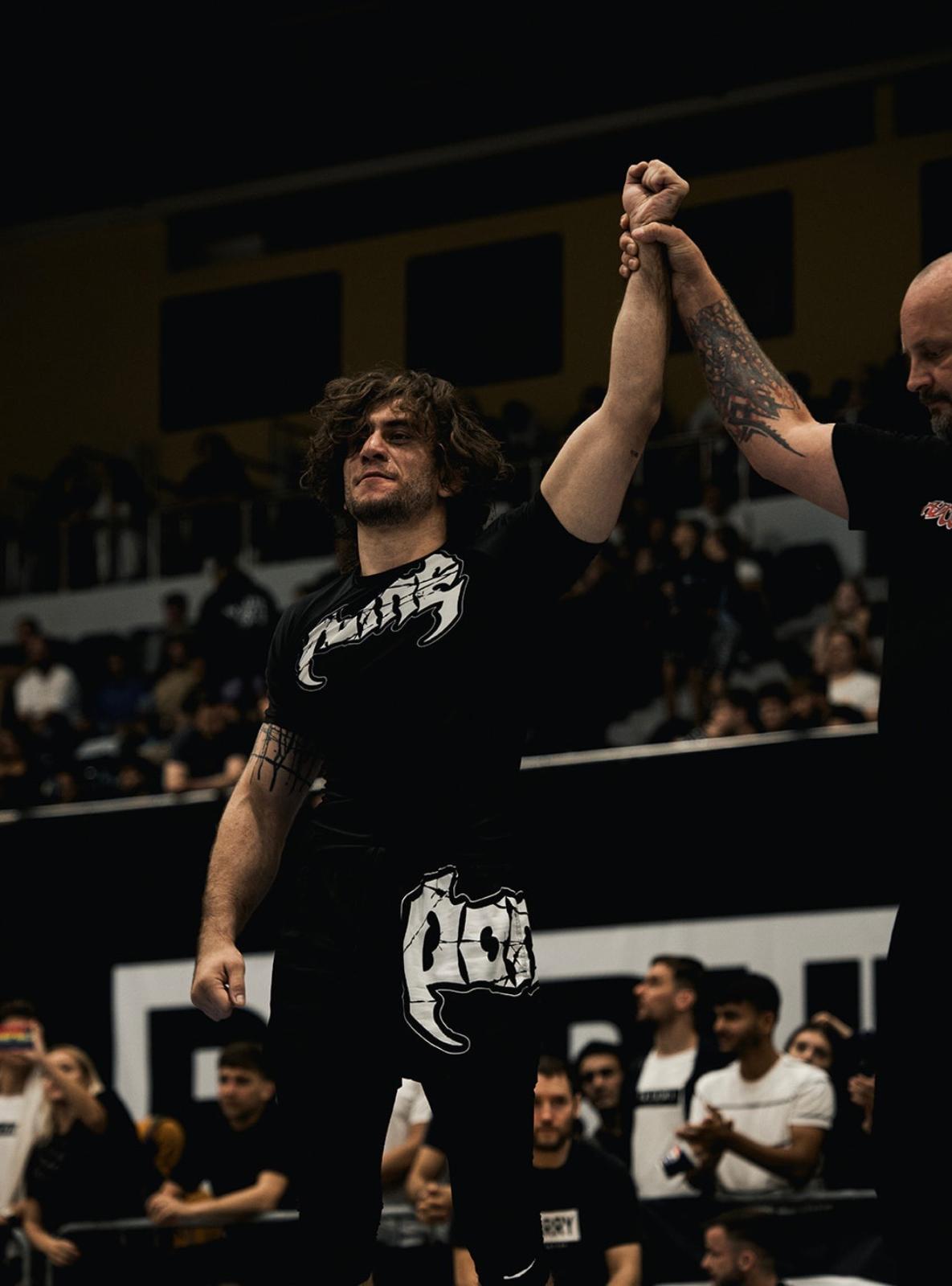 Sebastian Curelao as SEBI-BLACK-WINNER - Multiple Championships won including IBJJF DUBLIN OPEN, ADCC ROMANIA PRO, ADCC UK PRO